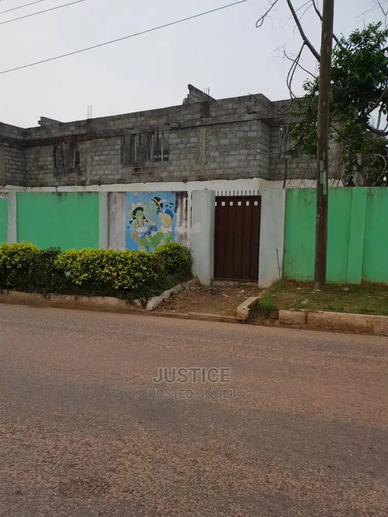 Strategic Located Old Building on 0.23 Acre Land Osu in Osu