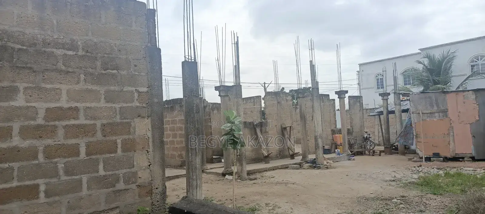 A Land With A Structure 4 Sale At Santoo Silicon Estate in Adenta