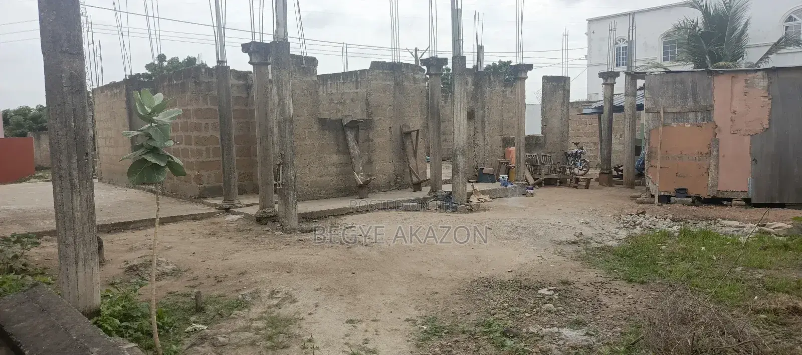 A Land With A Structure 4 Sale At Santoo Silicon Estate in Adenta
