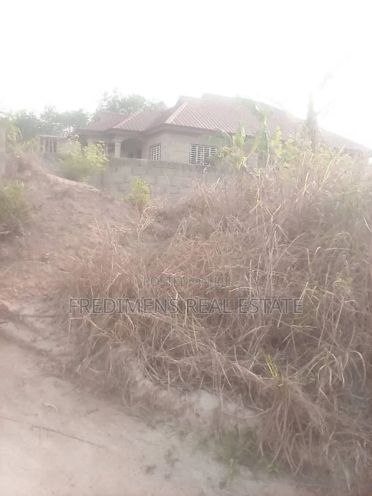 Land on Main Road at Aputuogya for Sale in Bosomtwe