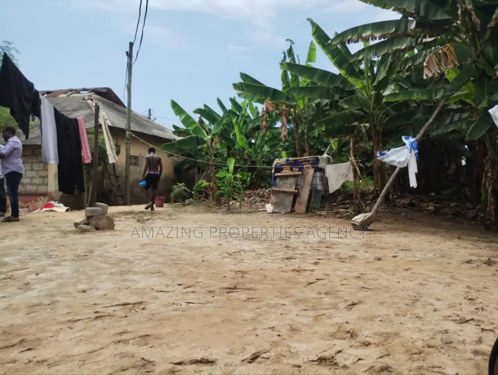 A. 0.24 Acre (One a Half Plots of Land) in Adabraka