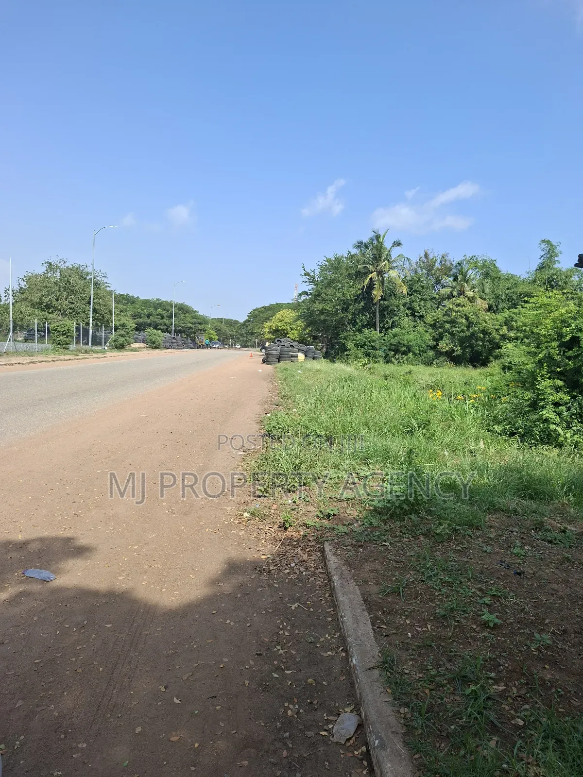 Half Roadside Commercial Plot at Community 7 in Tema Metropolitan