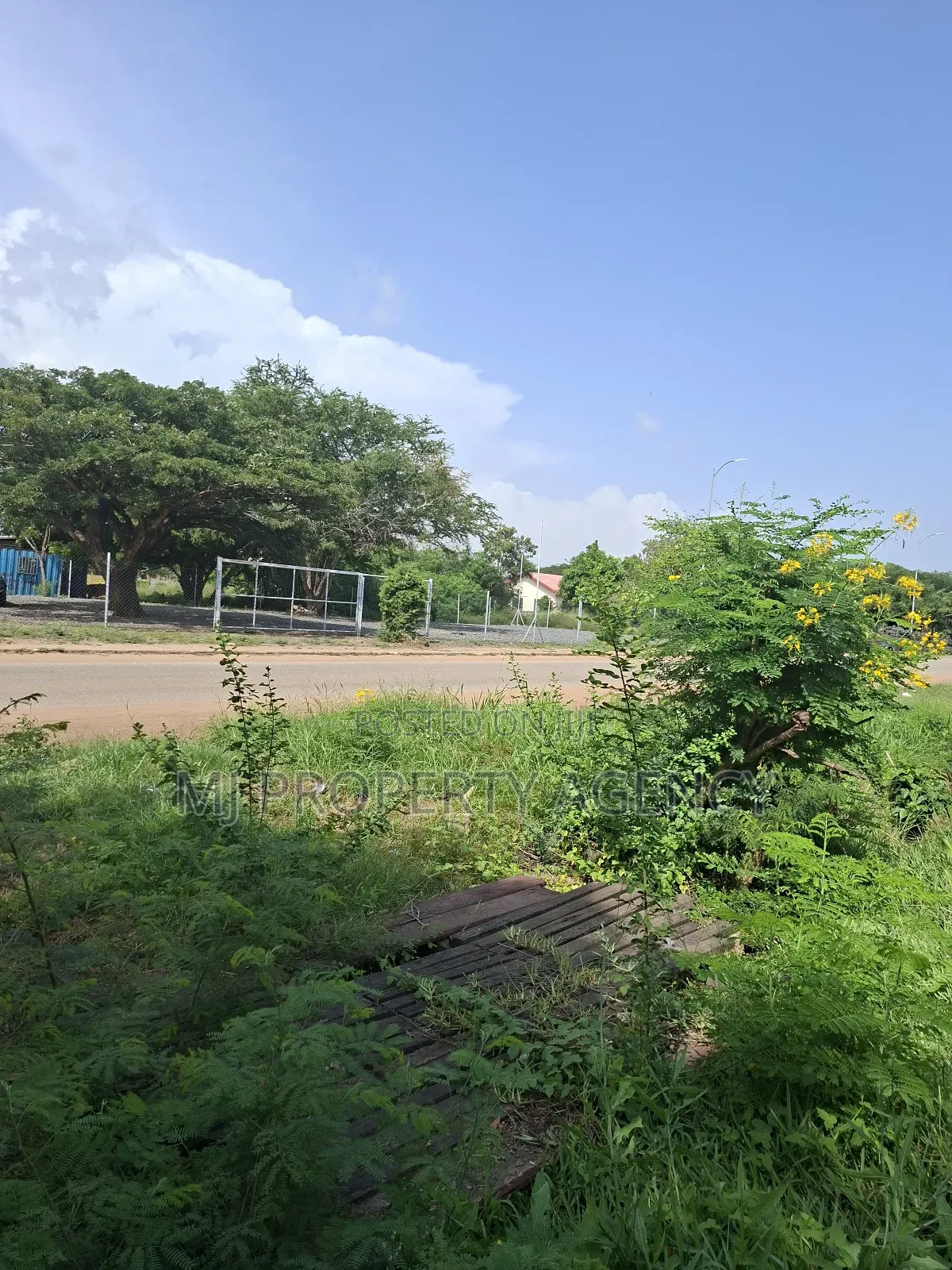 Half Roadside Commercial Plot at Community 7 in Tema Metropolitan