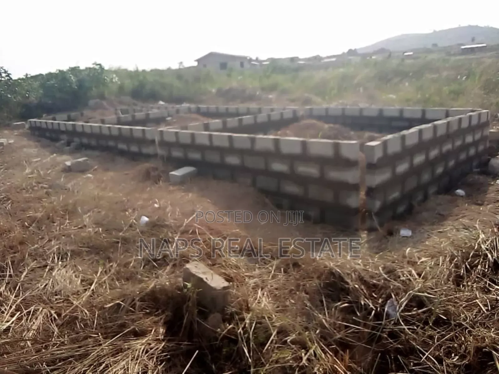 50/70 Plot of Land With Uncompleted Chamber and Hall Footings in Amasaman