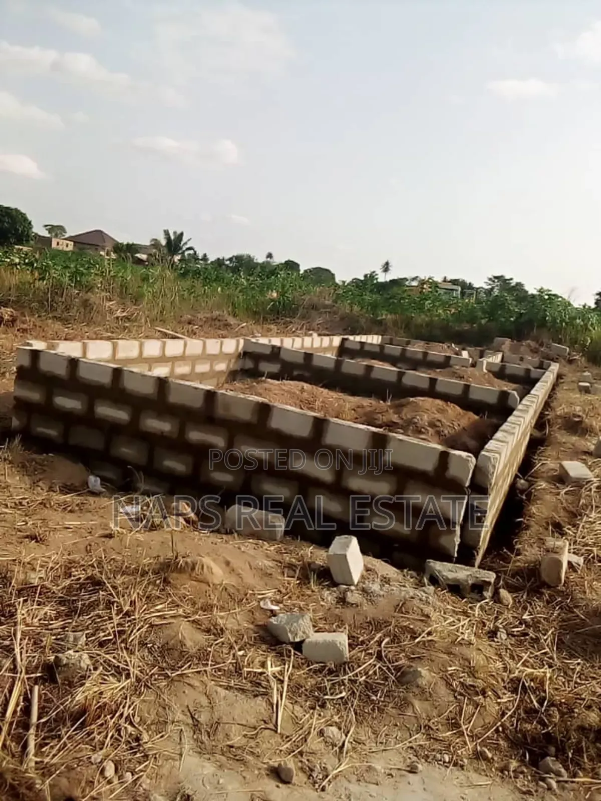 50/70 Plot of Land With Uncompleted Chamber and Hall Footings in Amasaman