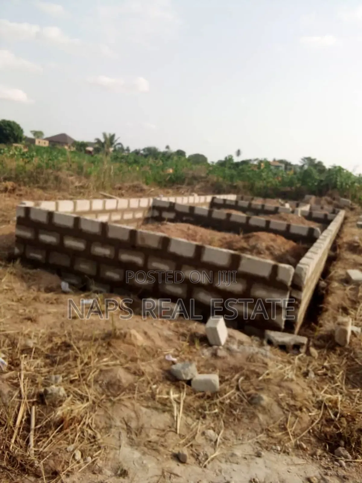 50/70 Plot of Land With Uncompleted Chamber and Hall Footings in Amasaman