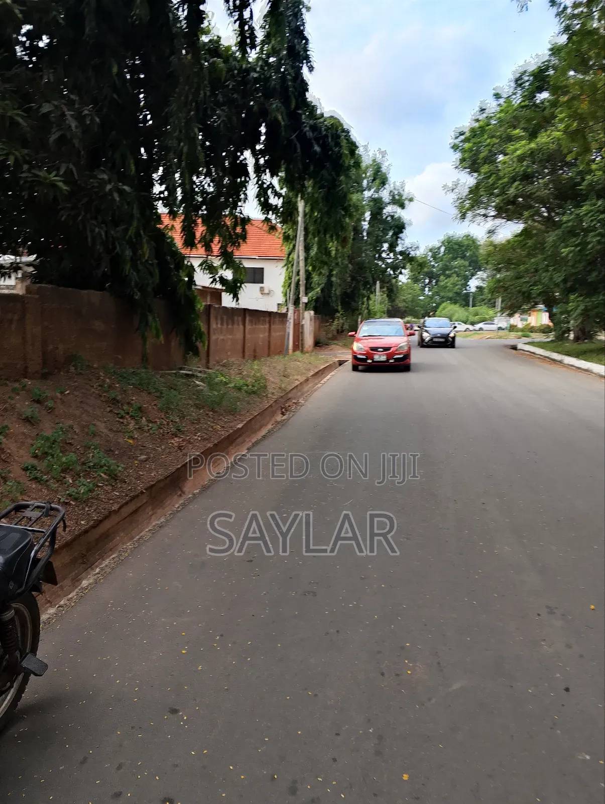 2 and Half Plots Verified TDC Documents Comm10, Facing Tarred Roads in Tema Metropolitan