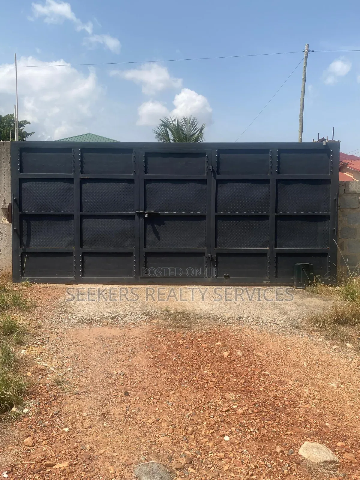 Roadside Land Walled and Gated 3 Plots of Land in Pentecost
