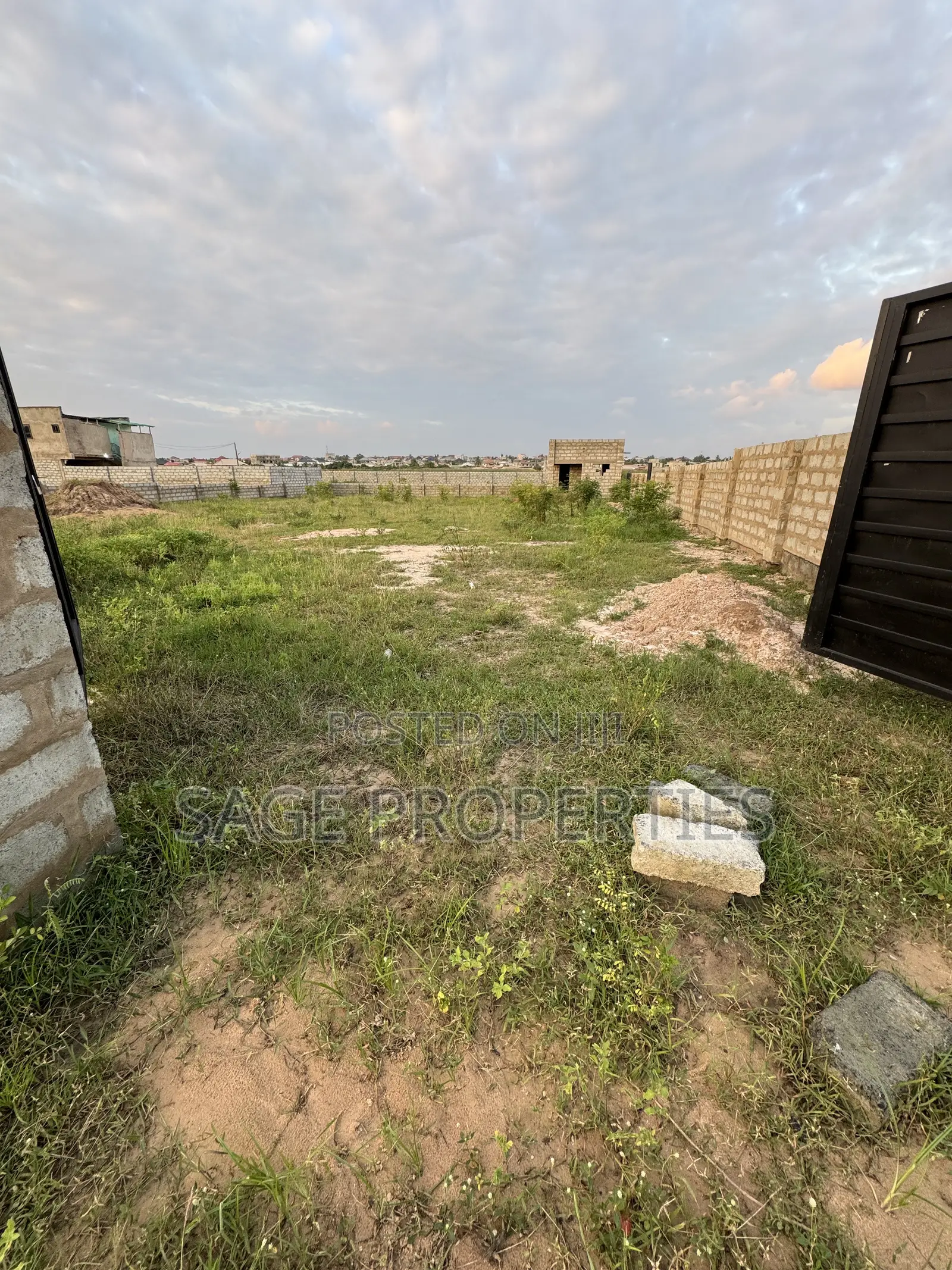 2 Plots Walled Land Around Montgomery Golf Resort in Nmai-Dzorn