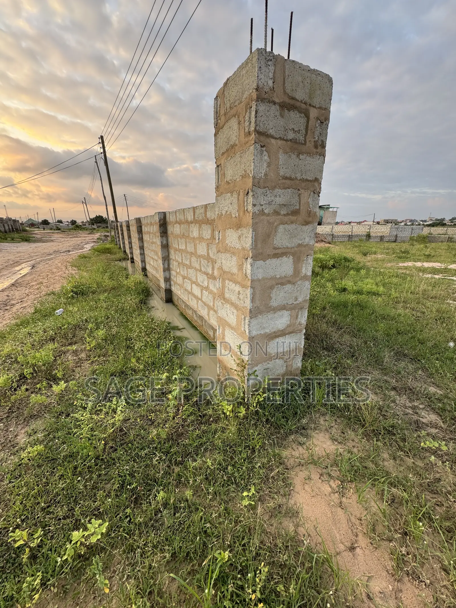 2 Plots Walled Land Around Montgomery Golf Resort in Nmai-Dzorn